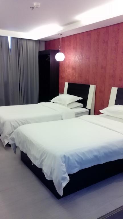 Fairyland Hotel Dongfeng Plaza Kunming Chambre photo